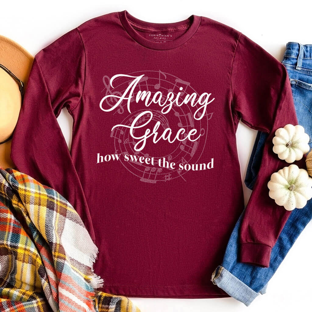 Long sleeve Christian shirt with two tone design of musical notes and amazing grace lyrics