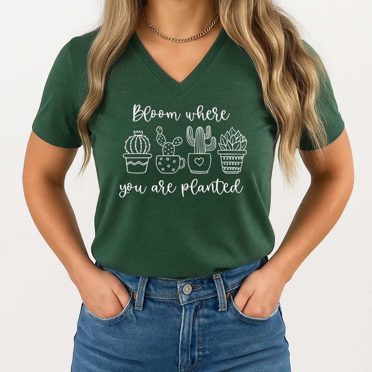 Person wearing a green Christian t-shirt with plant-themed design and text