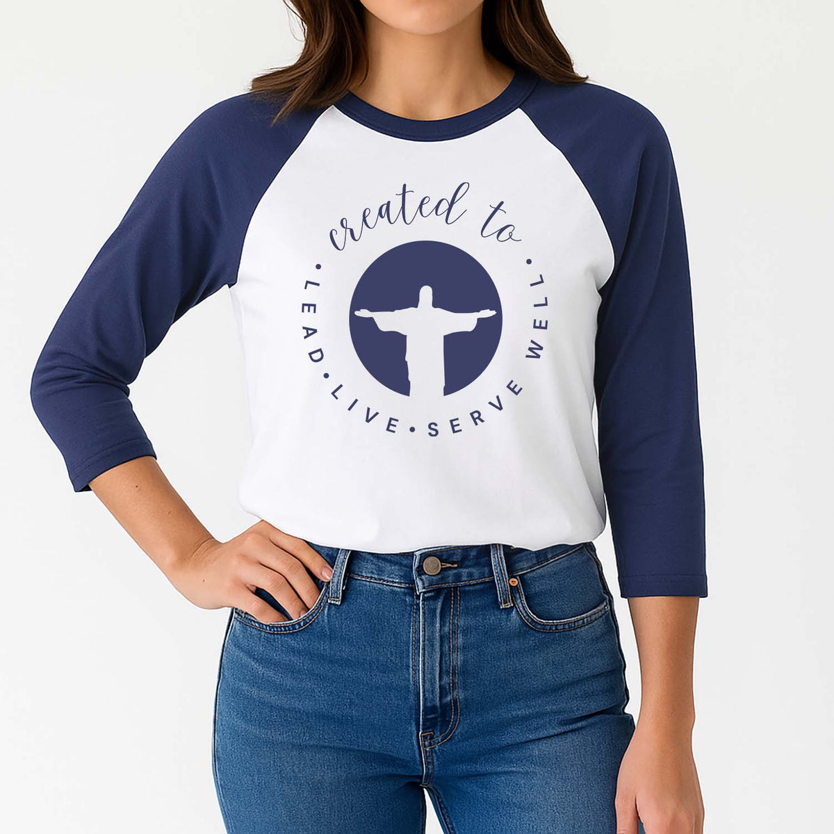 Woman wearing a blue and white Christian baseball shirt with a Jesus graphic design and text.
