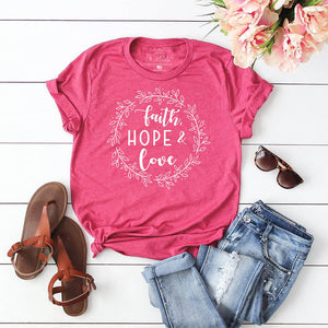 Faith hope love Christian design on vibrant pink tee