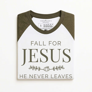 Raglan shirt with 'Fall for Jesus He Never Leaves' text on a white background