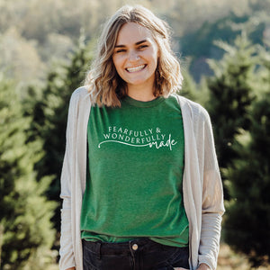 Fearfully and wonderfully made Biblical t-shirt worn outside among the trees
