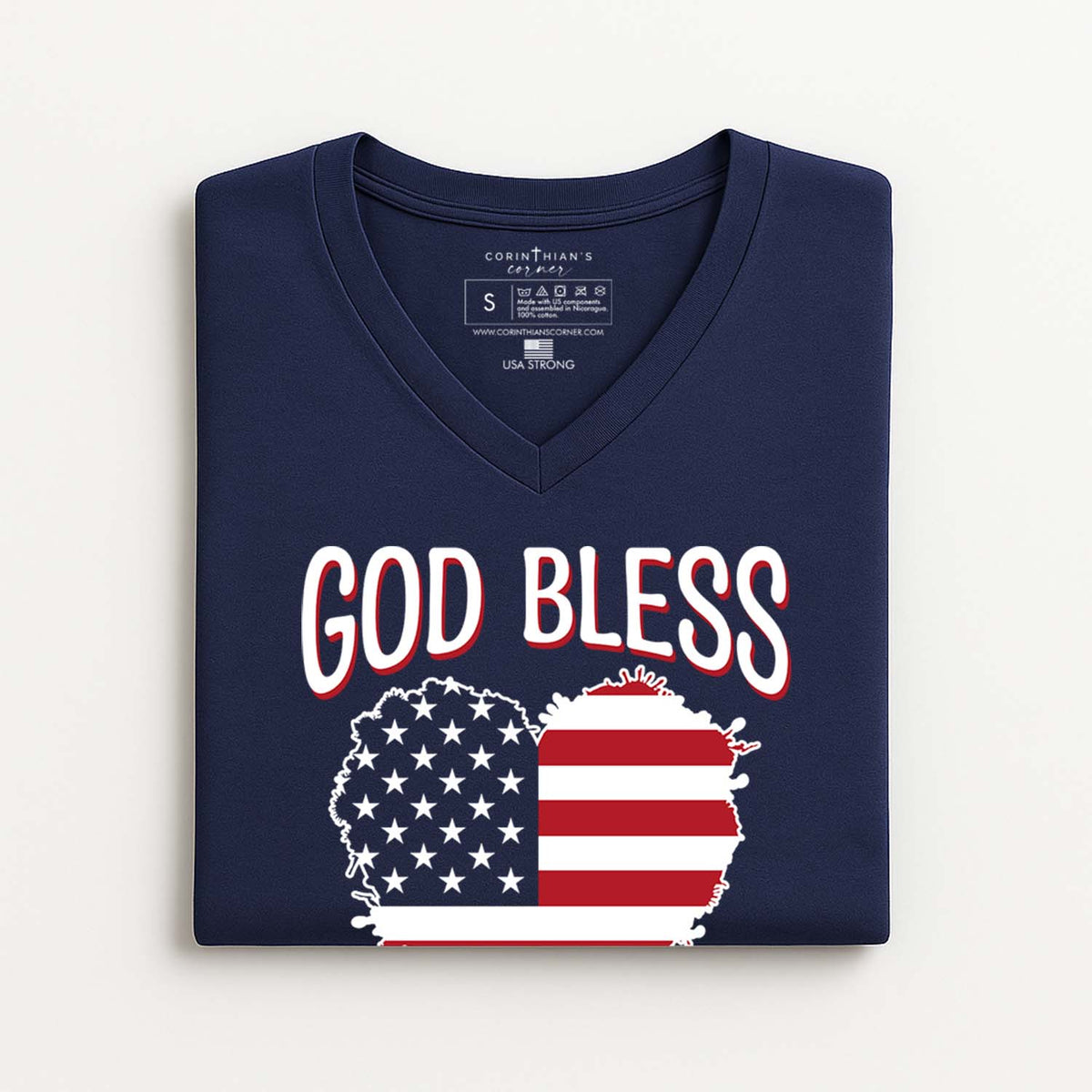 Navy blue t-shirt with 'GOD BLESS' and American flag design on a white background