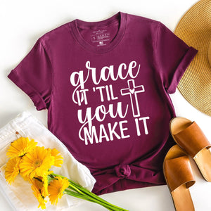 Grace it 'til you make it graphic Christian t-shirt in maroon