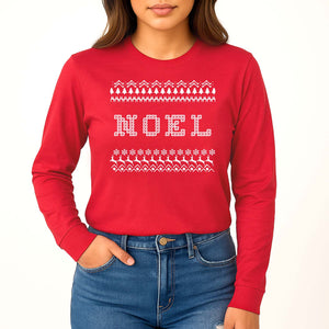 Red long-sleeve shirt with 'NOEL' and winter pattern worn by a person on a white background