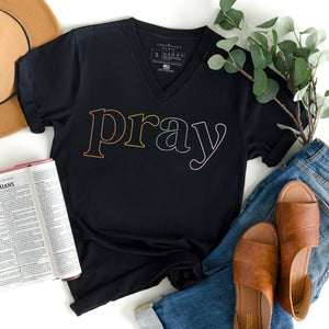 Multi-color Christian v-neck shirt that reads PRAY in neon pattern