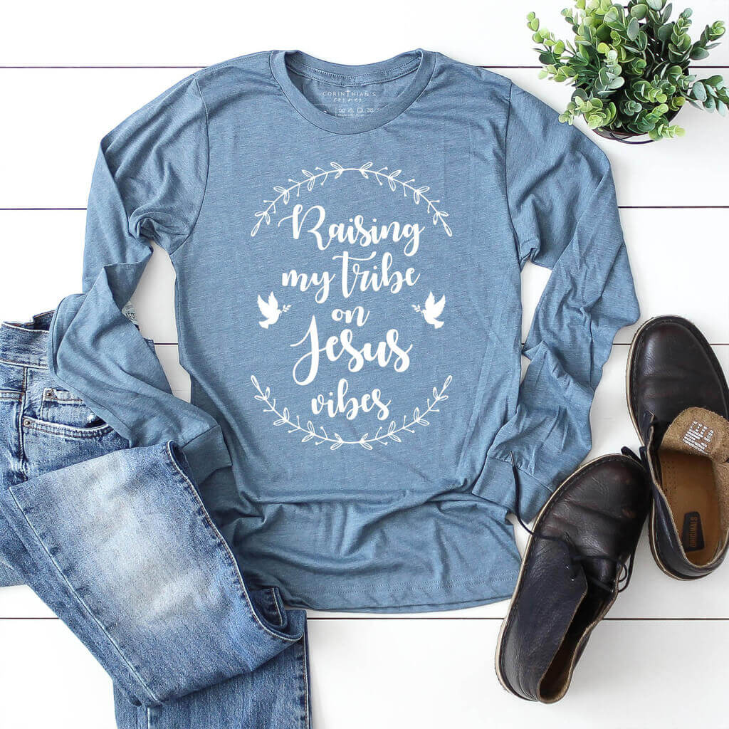 Long sleeve shirt for Christian moms that reads raising my tribe on Jesus vibes