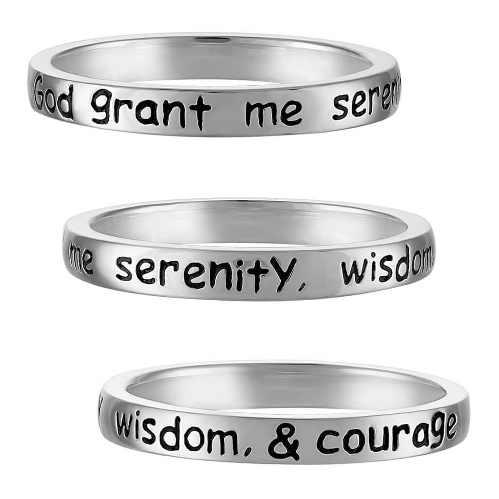 Close-up view of faith-inspired prayer ring made with sterling silver