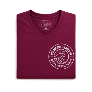 Folded maroon v-neck with white graphic and Luke 1:50 inscription