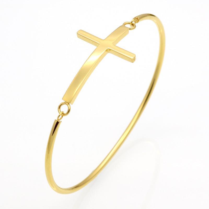 Durable and rigid gold bracelet with a cross over the top of the wrist