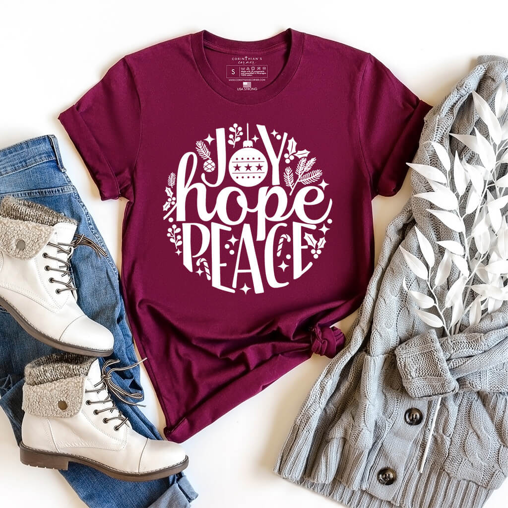 Joy hope and peace t-shirt design in the shape of a Christmas ornament