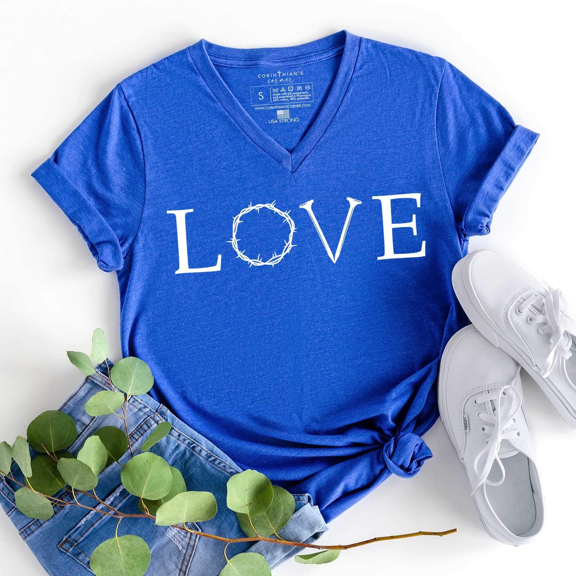 Blue Easter t-shirt that reads LOVE with thorn crown and nail design
