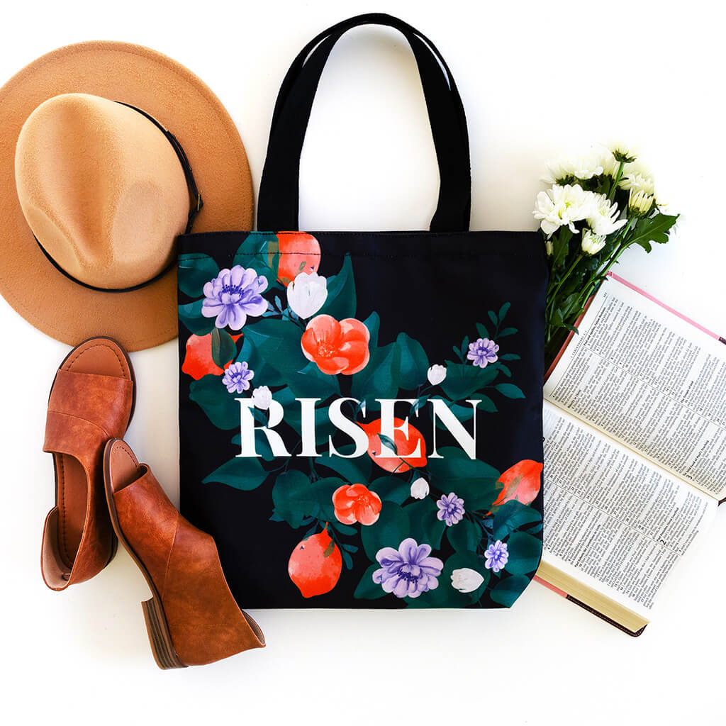 Black tote bag with bold statement about Christ's resurrection