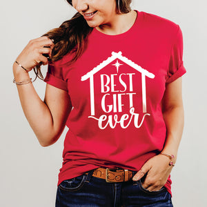 Happy woman wearing the best gift ever Christmas t-shirt to honor baby Jesus