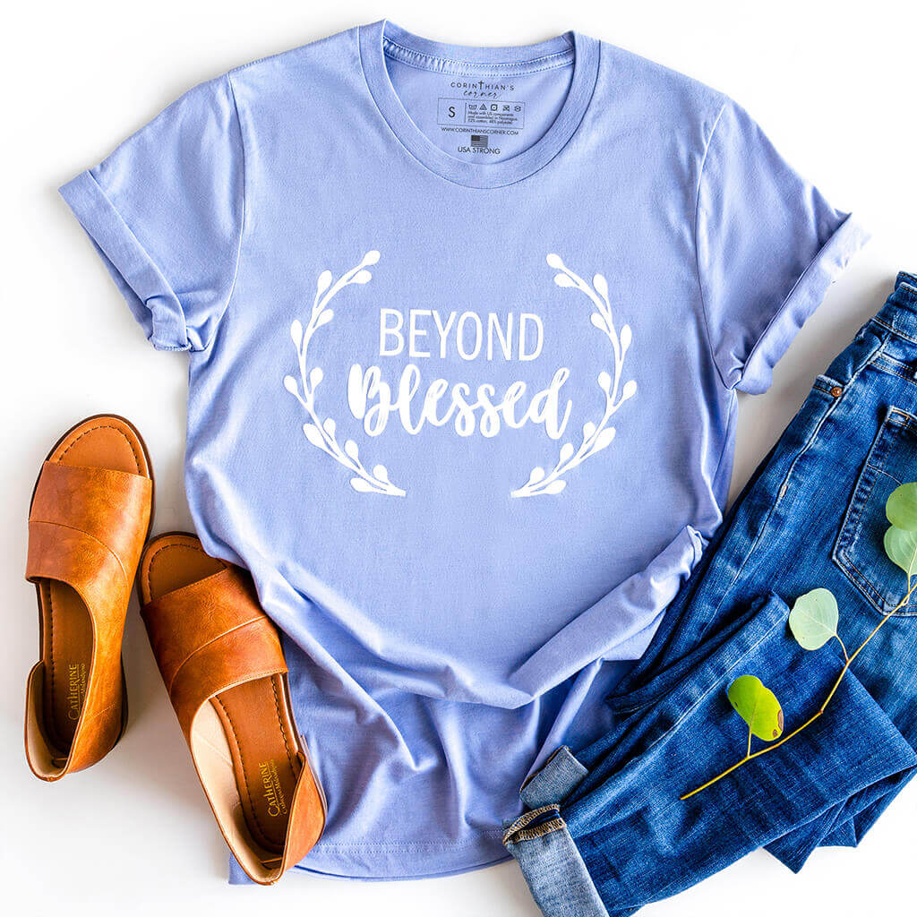 Premium light blue beyond blessed t-shirt with floral adornment