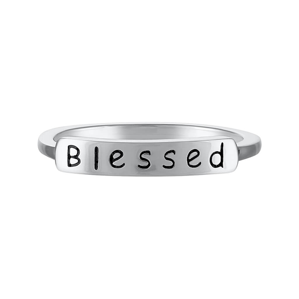 Ring engraved with the word 'blessed', symbolizing God's abundant grace and favor