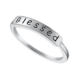 Elegant ring showcasing the inscription 'blessed', reflecting gratitude and deep faith