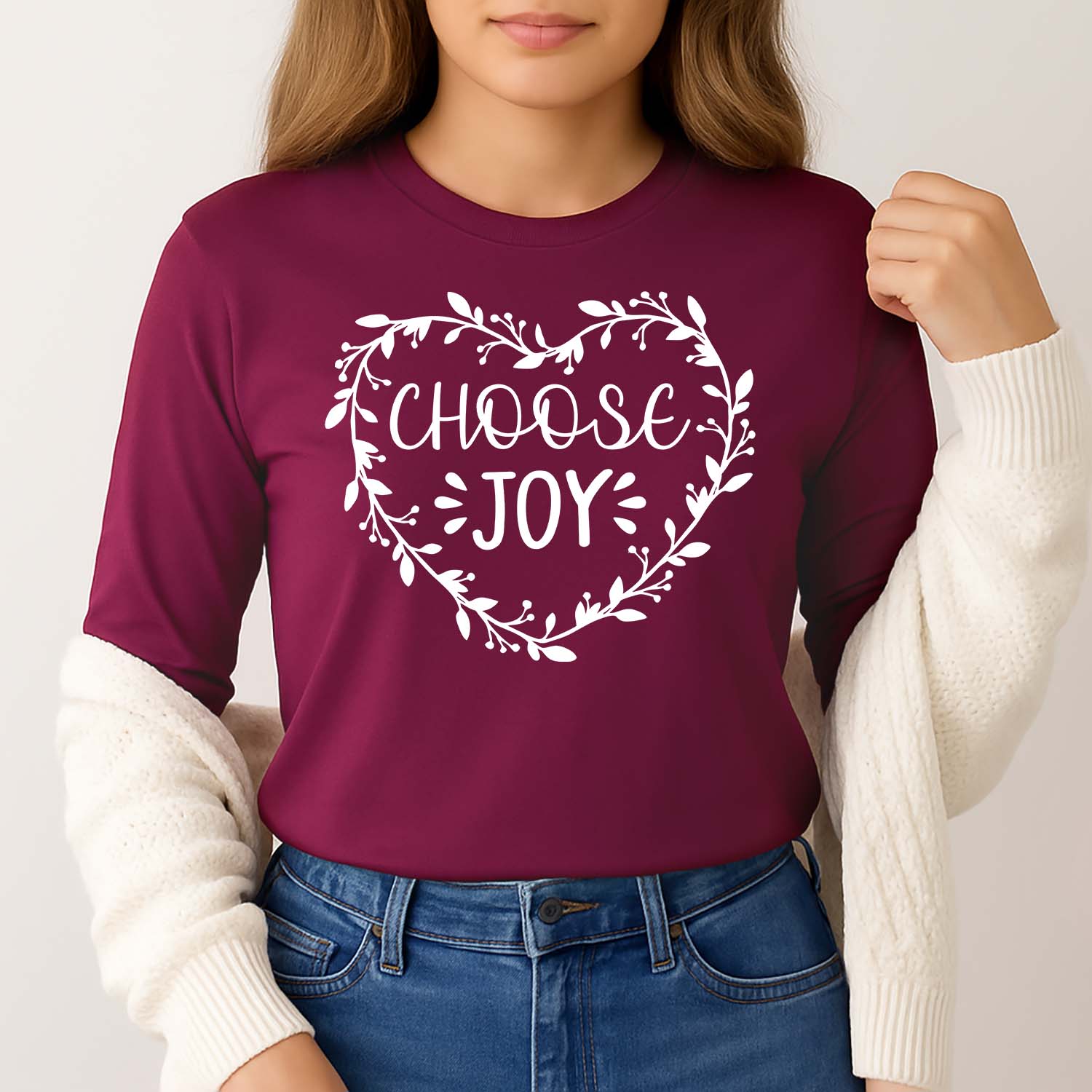Uplifting Christian long sleeve shirt in maroon that reads choose joy