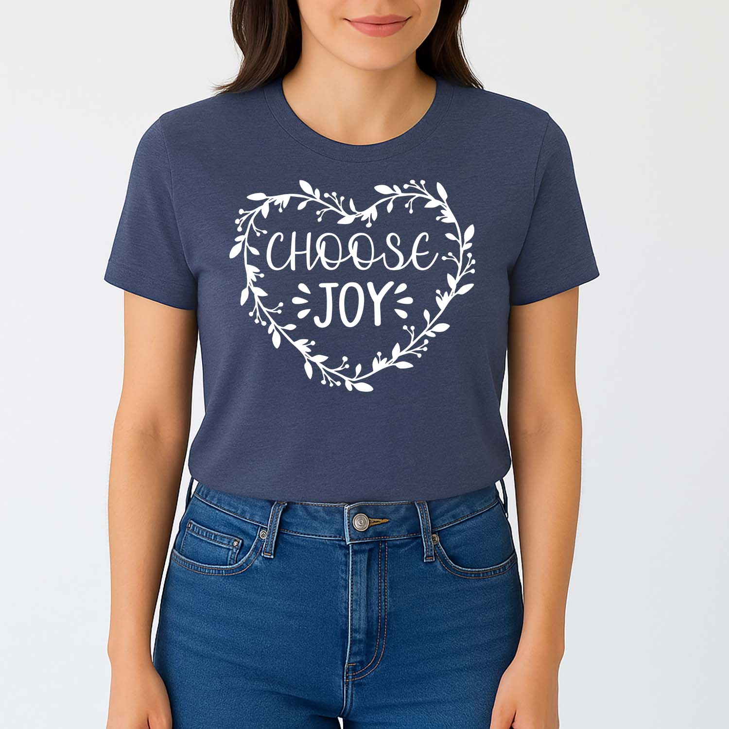 Person wearing a maroon t-shirt with 'Choose Joy' design on a plain background