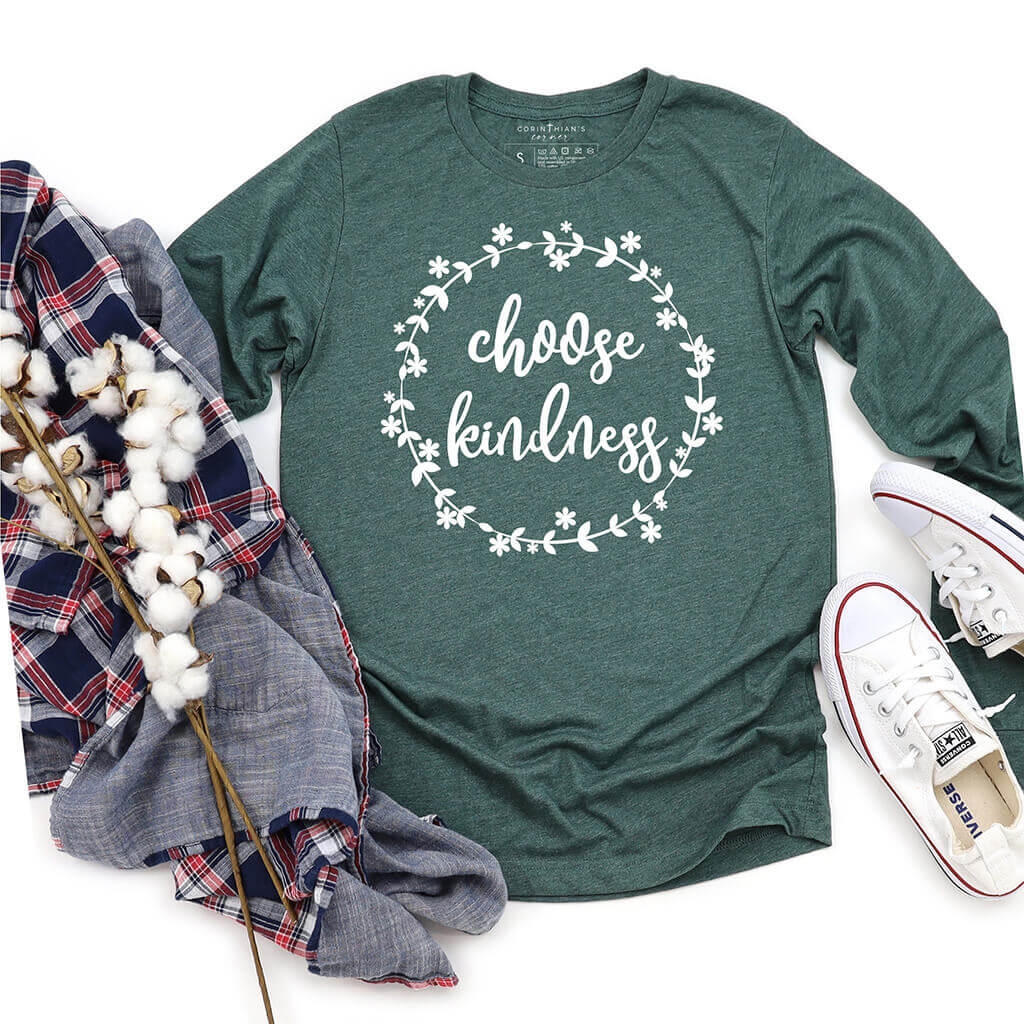 Uplifting choose kindness design on a green long sleeve top