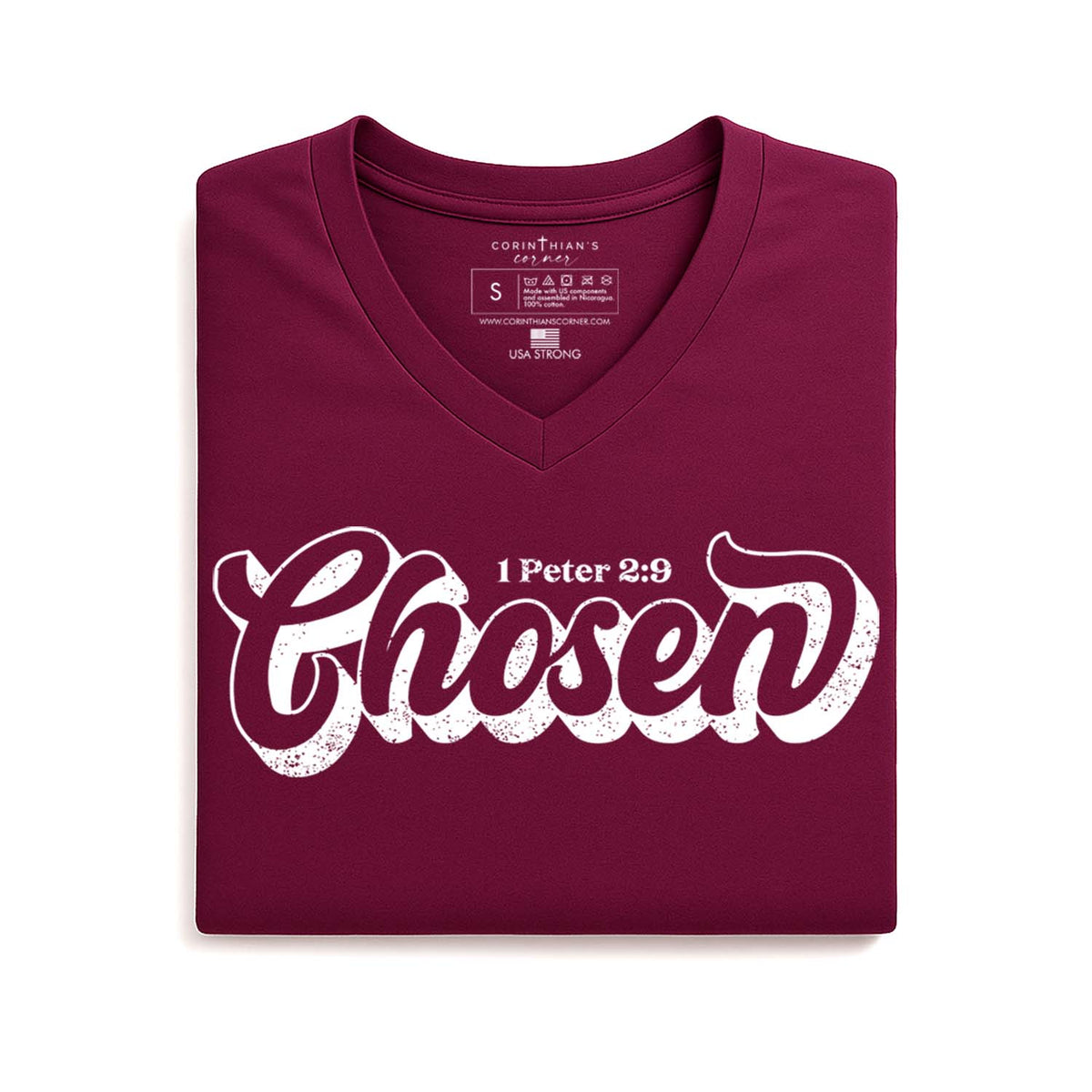 Folded maroon t-shirt with 'Chosen' text on a white background