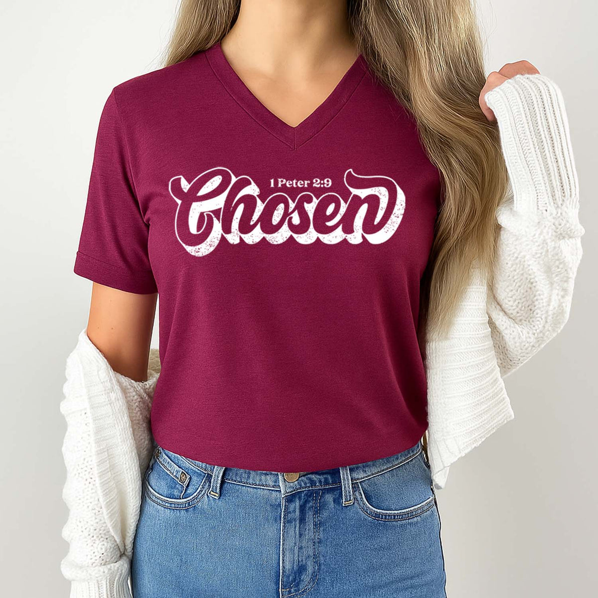 Chosen t-shirt in maroon inspired by 1 Peter 2:9 worn by a young woman