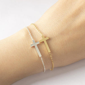Two cross chain bracelets on one wrist highlighting the two color options for Christian women