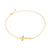 Dainty gold cross chain bracelet with lobster clasp laid out in a circle