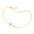 Dainty gold cross chain bracelet with lobster clasp laid out in a circle