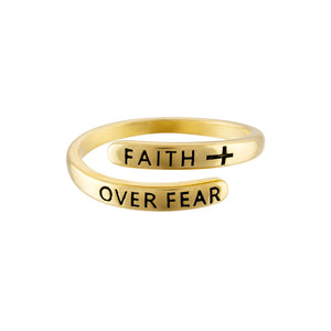 The adjustable Faith Over Fear ring is plated with yellow 18 karat gold