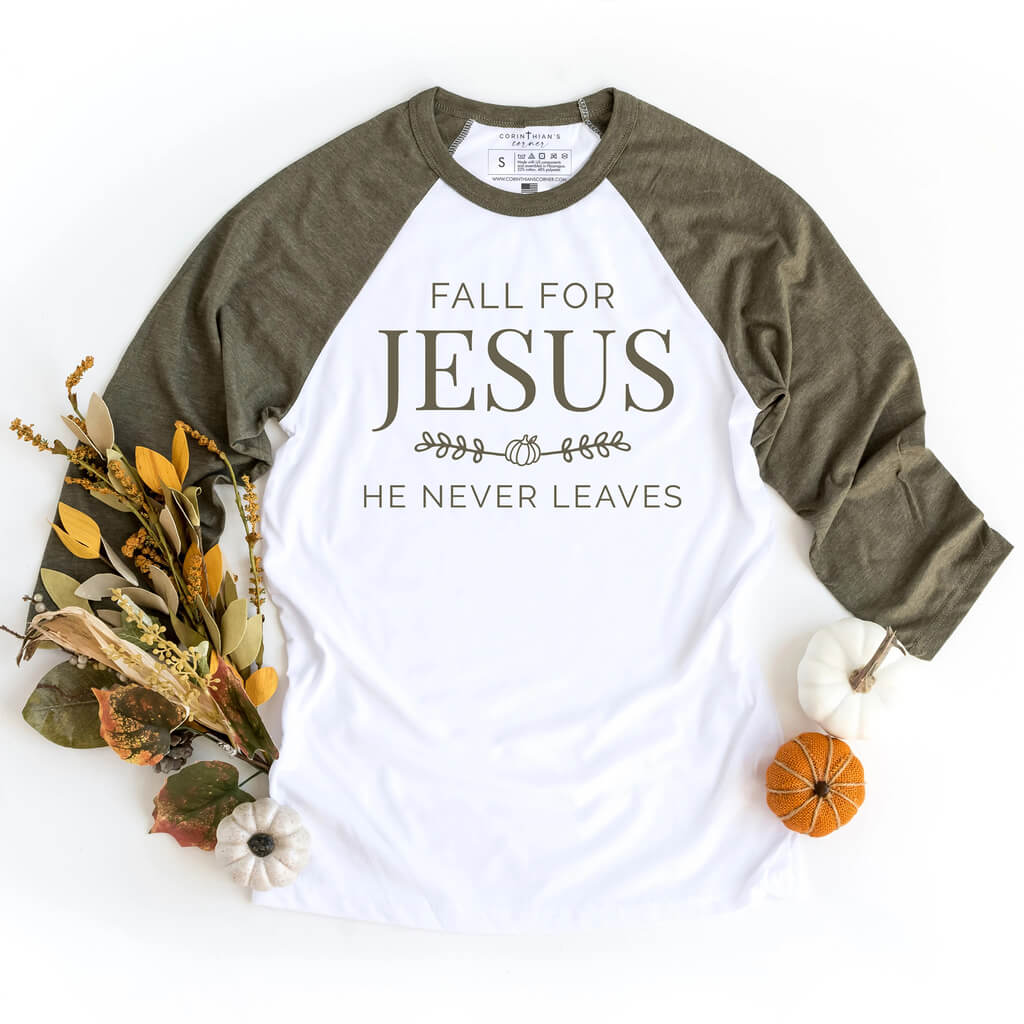 Olive shirt with 3/4 sleeves that reads fall for Jesus he never leaves