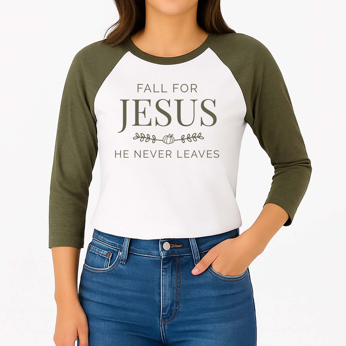 Person wearing a green and white 3/4 sleeve shirt with text 'Fall for Jesus, He Never Leaves' on a plain background
