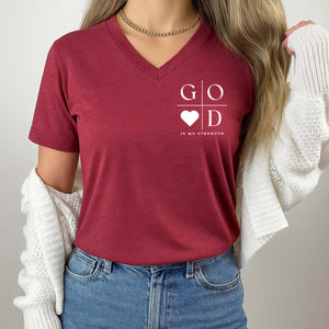 Person wearing a red t-shirt with 'GOD IS MY STRENGTH' text and design.