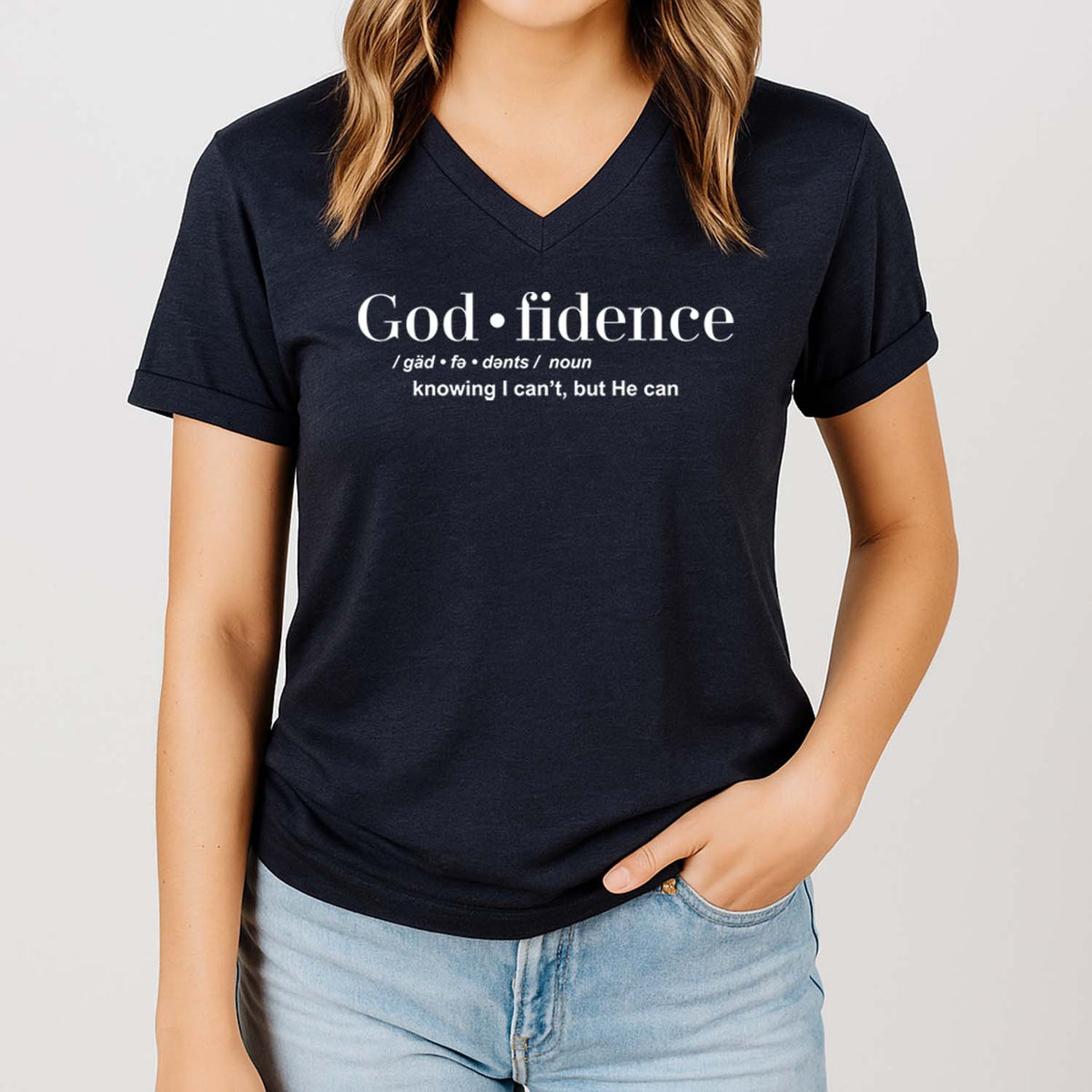 Woman wearing a black t-shirt with 'God-fidence' text design