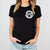 Good news Jesus saves t-shirt for women in black with matching shoes and jeans