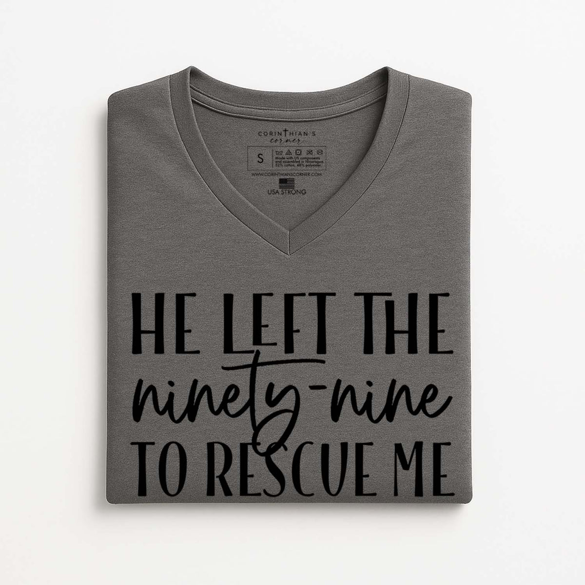 Folded gray t-shirt with Matthew Bible verse on a white background