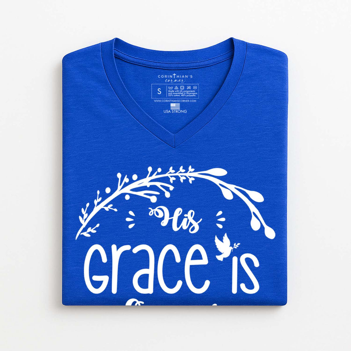 His Grace Is Enough v-neck t-shirt with white text on a blue shirt