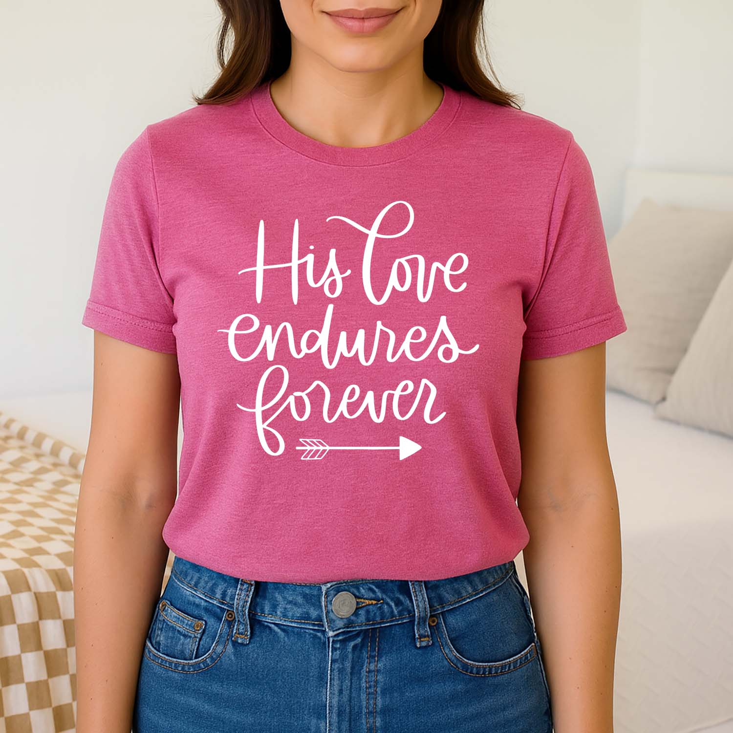 Vibrant pink t-shirt with 'His Love Endures Forever' written in white lettering to celebrate Psalm 136