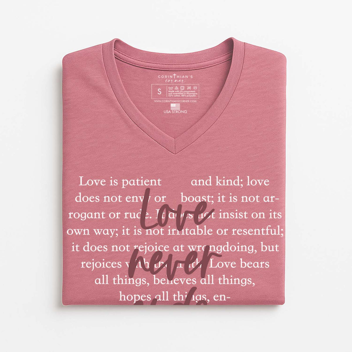 Pink v-neck Christian t-shirt with religious text on a white background