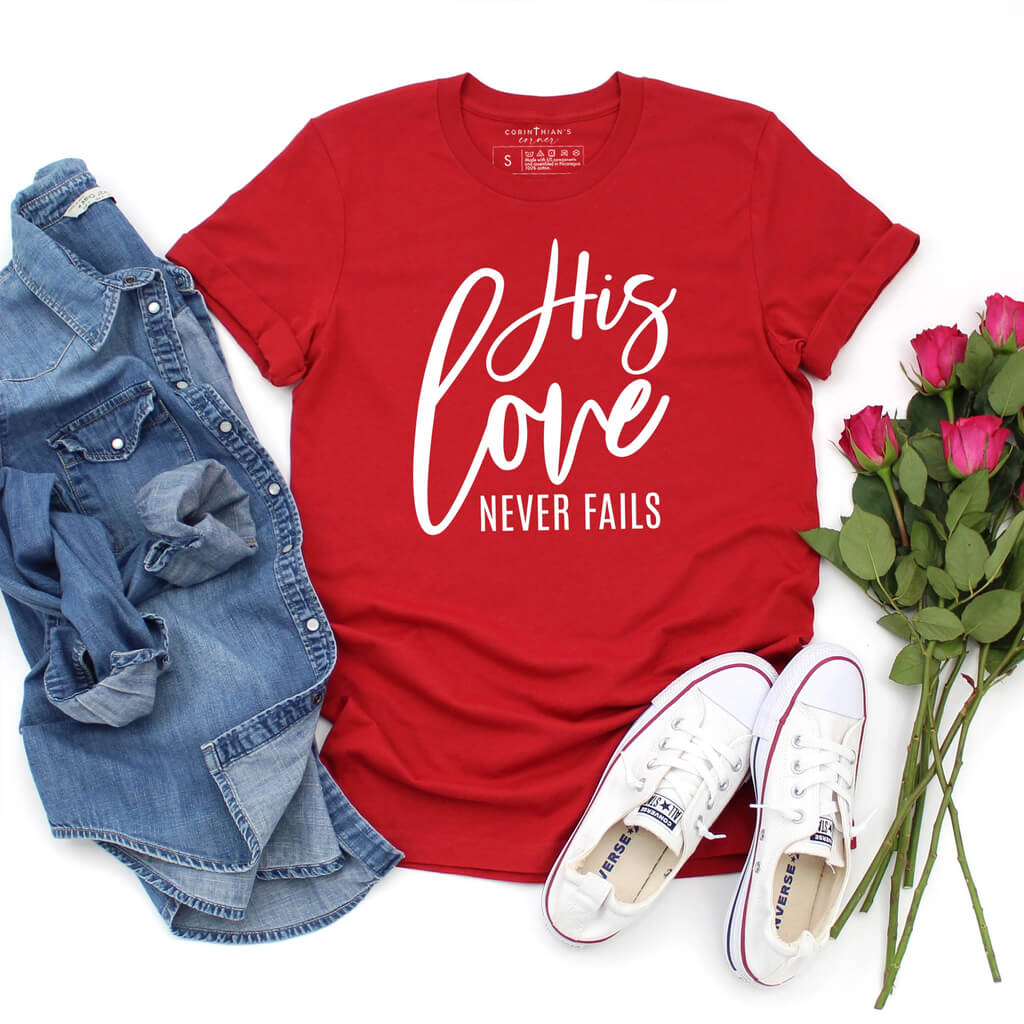 Our bright red Valentine's day shirt proudly declares "His love never fails"