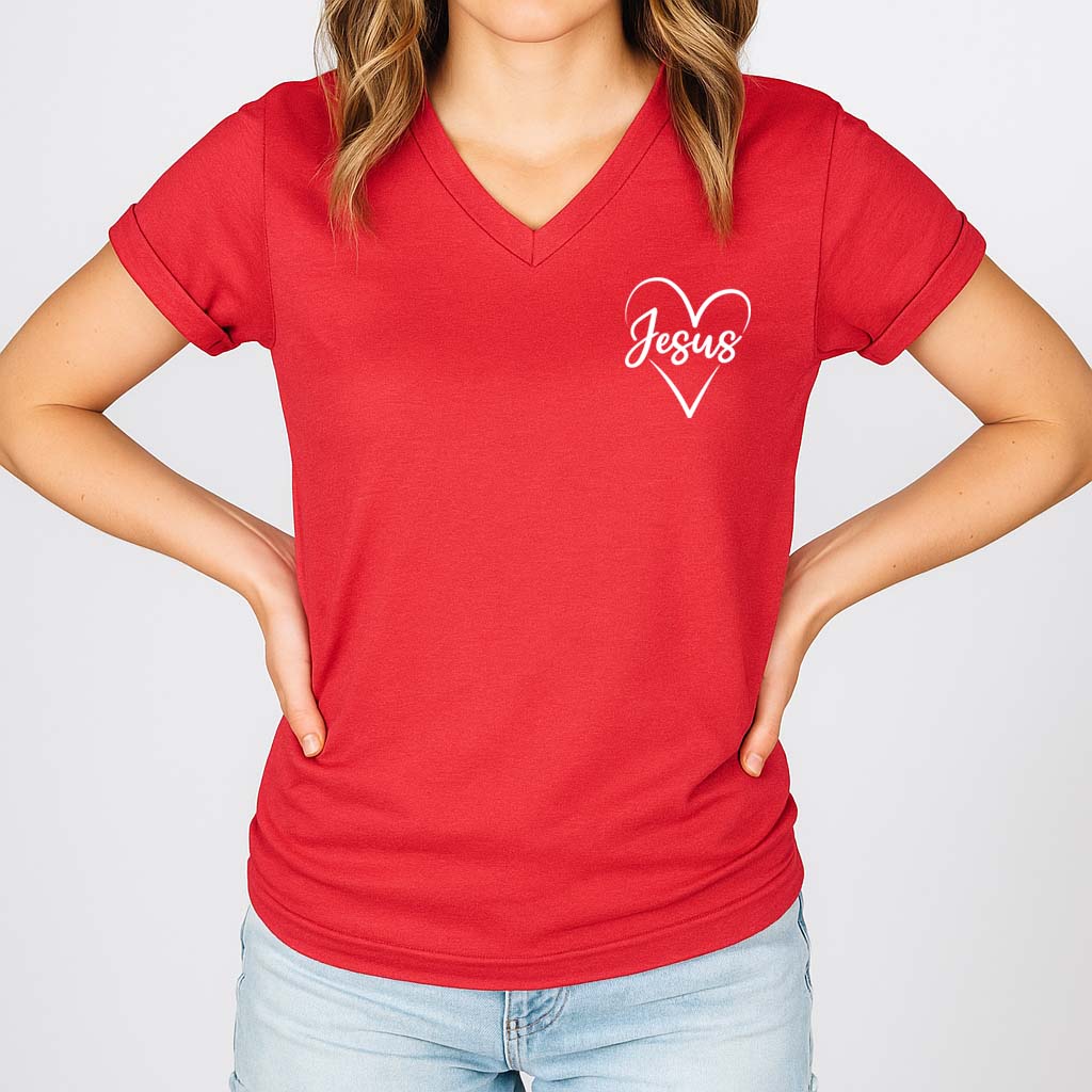 Red V-neck t-shirt with 'Jesus' in a heart shape worn by a young woman