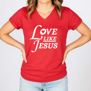 Red t-shirt with 'Love Like Jesus' text worn by a woman on a white background