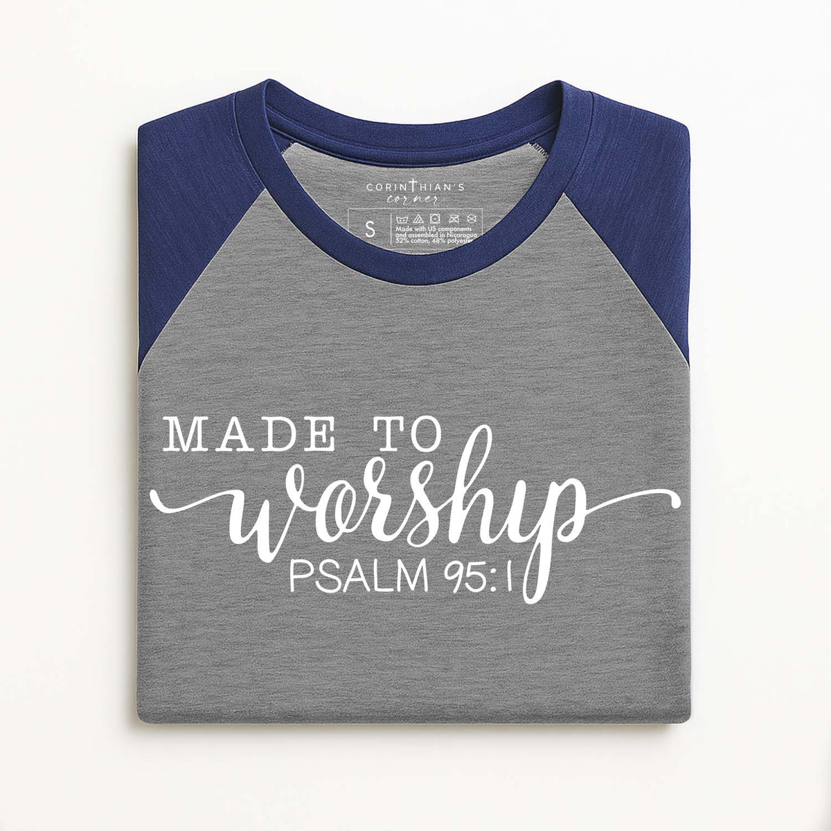 Made to worshi pPsalm 95:1 screenprinted on a grey and navy baseball shirt