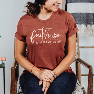 Seated woman looking at her faith the size of a mustard seed Biblical t-shirt