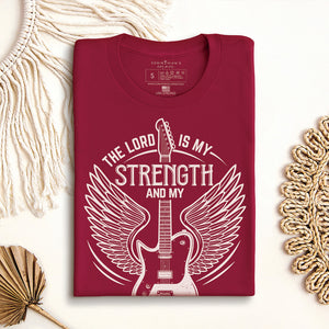 Folded cardinal t-shirt that reads the Lord is my strength and my song