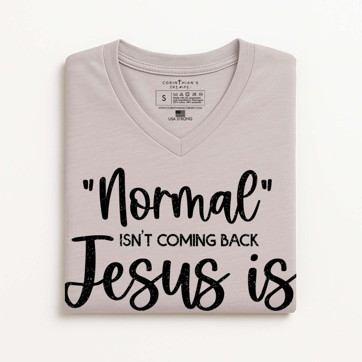 Folded light gray t-shirt with black text on a white background