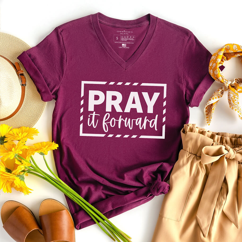 Inspiring Christian v-neck shirt that reads pray it forward