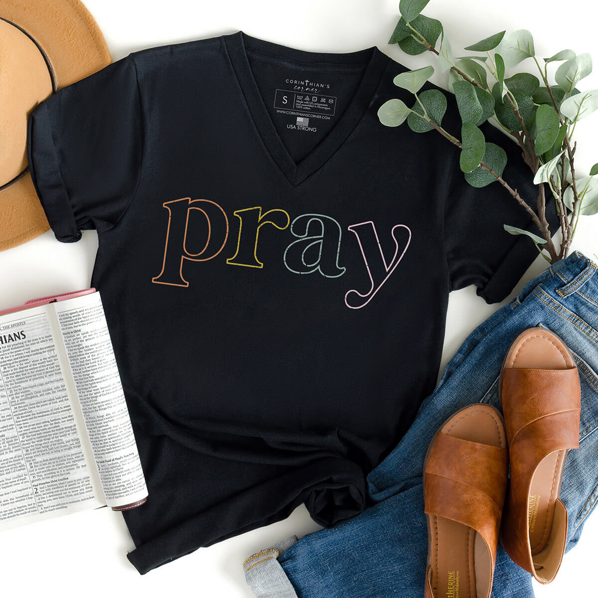 Multi-color Christian v-neck shirt that reads PRAY in neon pattern
