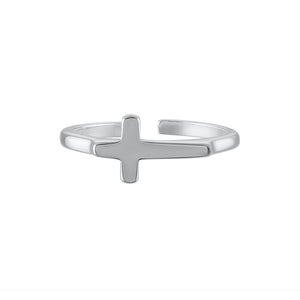 The silver Raised Cross Ring sits on its side highlighting the premium materials and polished shine