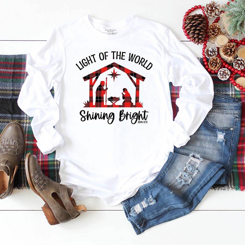 Light of the world shining bright multicolor Christmas design on a stunning white long sleeve shirt